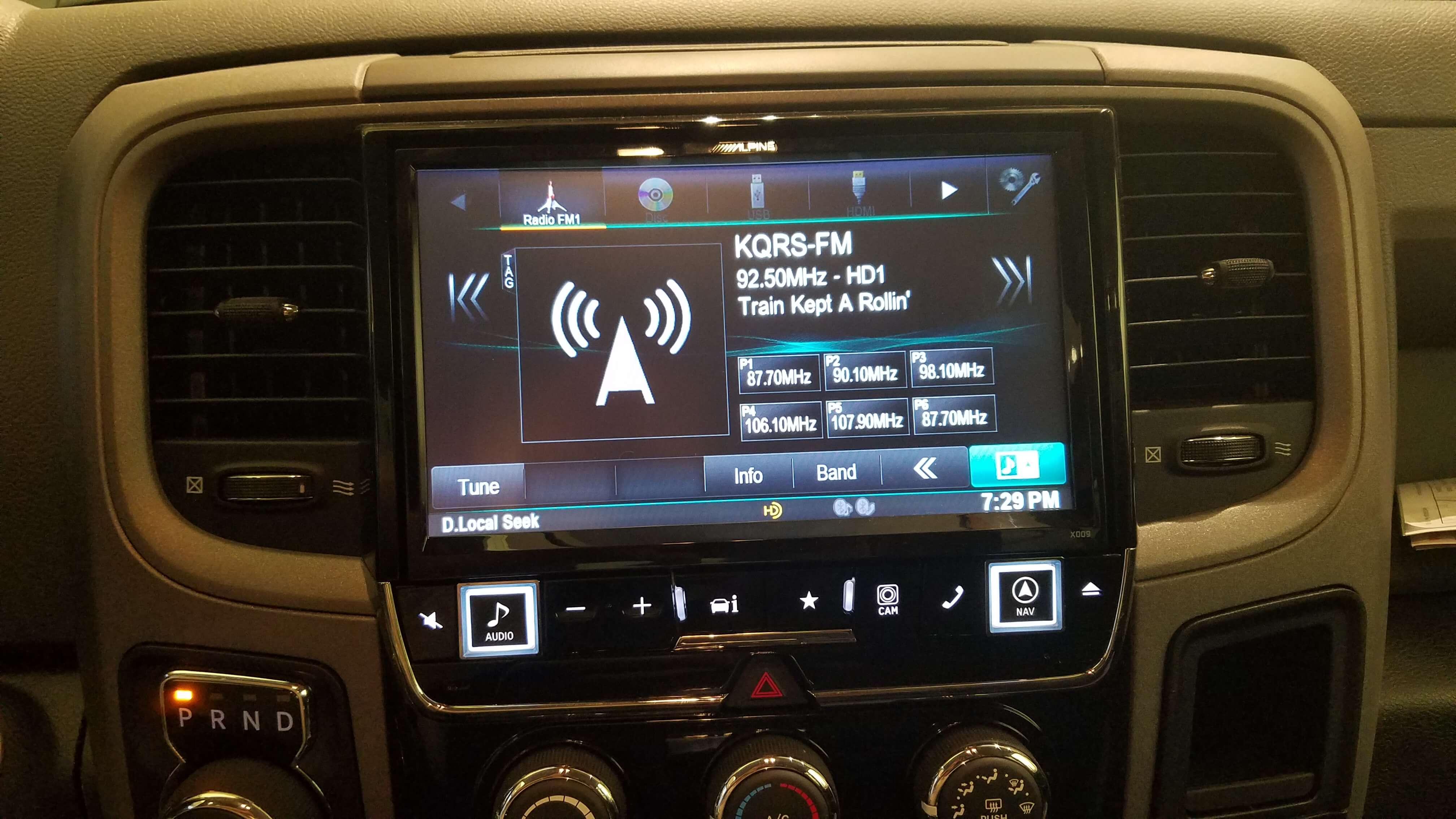 Alpine 9” in dash system - Uncompressed audio system, Navigation, smartphone connectivity, integrated accessory controls back up camera and vehicle system monitoring.  This system is designed specifically for your RAM and looks like it came from the factory with it.